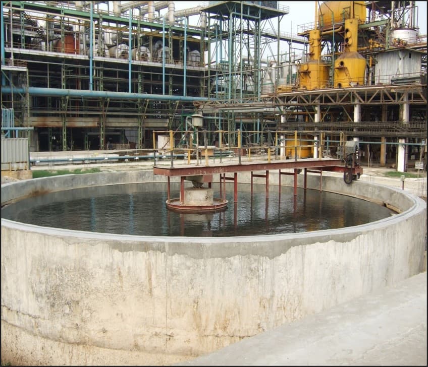 Circular gravity clarifier tank at an industrial wastewater treatment plant